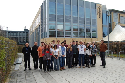 Group of students and staff outside the Cambridge Graphene Centre