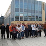 Group of students and staff outside the Cambridge Graphene Centre