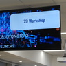 Overhead projection slide with the workshop title shown